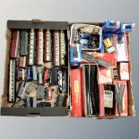 Two boxes of Hornby rolling stock, coaches, wagons, track and accessories,