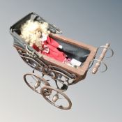 A child's pram and doll