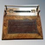 A Victorian rosewood clerk's slope with inset panel