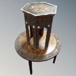 A Continental carved occasional table together with a far eastern Moorish style table