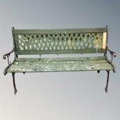 A wooden and metal ended garden bench