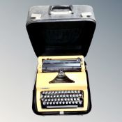 An Erika manual typewriter in case.