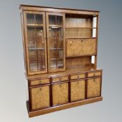 A Willis and Gambier cocktail display wall unit in walnut finish