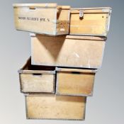 Six 20th century metal bound packing crates.