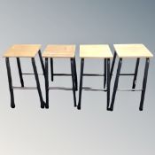A set of four laboratory stools