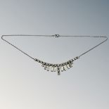An Art Deco silver and paste necklace.