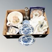 A box of two Chinese blue and white plates, glass decanter, table linen.