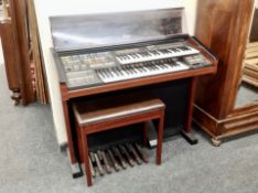 An Electrone electric organ with stool