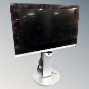 A Bang & Olufsen 7-40 motorised TV on stand