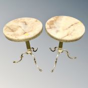 A pair of onyx effect brass wine tables