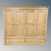 A pine four drawer wardrobe fitted with two drawers CONDITION REPORT: measures :