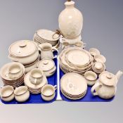 A large quantity of Denby stoneware, teaware, dinnerware, large table lamp.