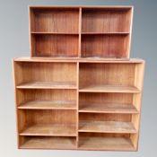 A teak bookcase and a further continental bookcase