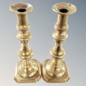 A pair of Victorian brass candlesticks.