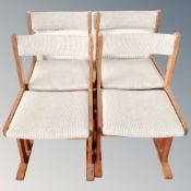 Four 20th century teak framed dining room chairs