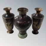 A pair of Niello style six sided miniature vases,
