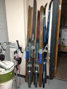Seven pairs of mid century and later skis
