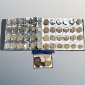 A coin album and box containing pre-decimal coins,