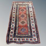 A Caucasian rug of geometric design 119 cm x 206 cm