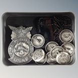 A bag of white metal regimental buttons, set of two dog tags on necklace,