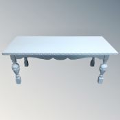 A 20th century painted coffee table