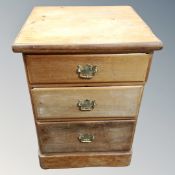 A 19th century pine three drawer chest