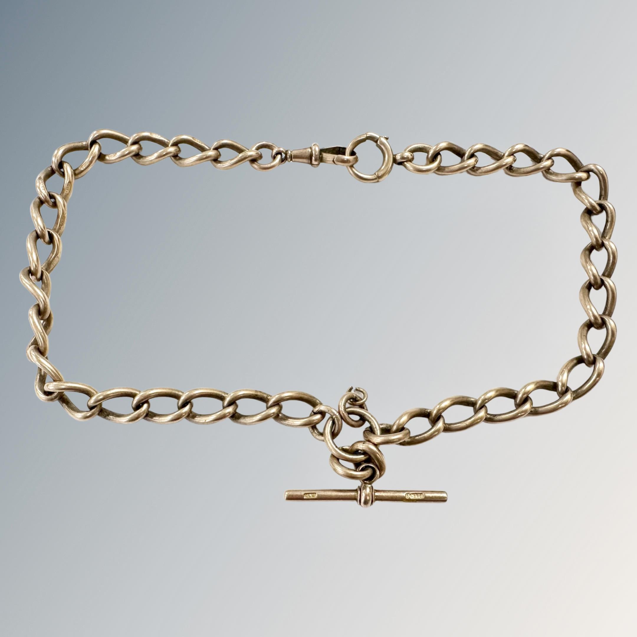 A 9ct gold Albert chain with T-bar, length 40cm CONDITION REPORT: 60.