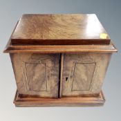 A Victorian walnut table box.