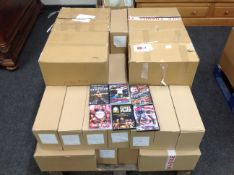 A pallet a quantity of stock boxes containing wrestling dvds, new and sealed.