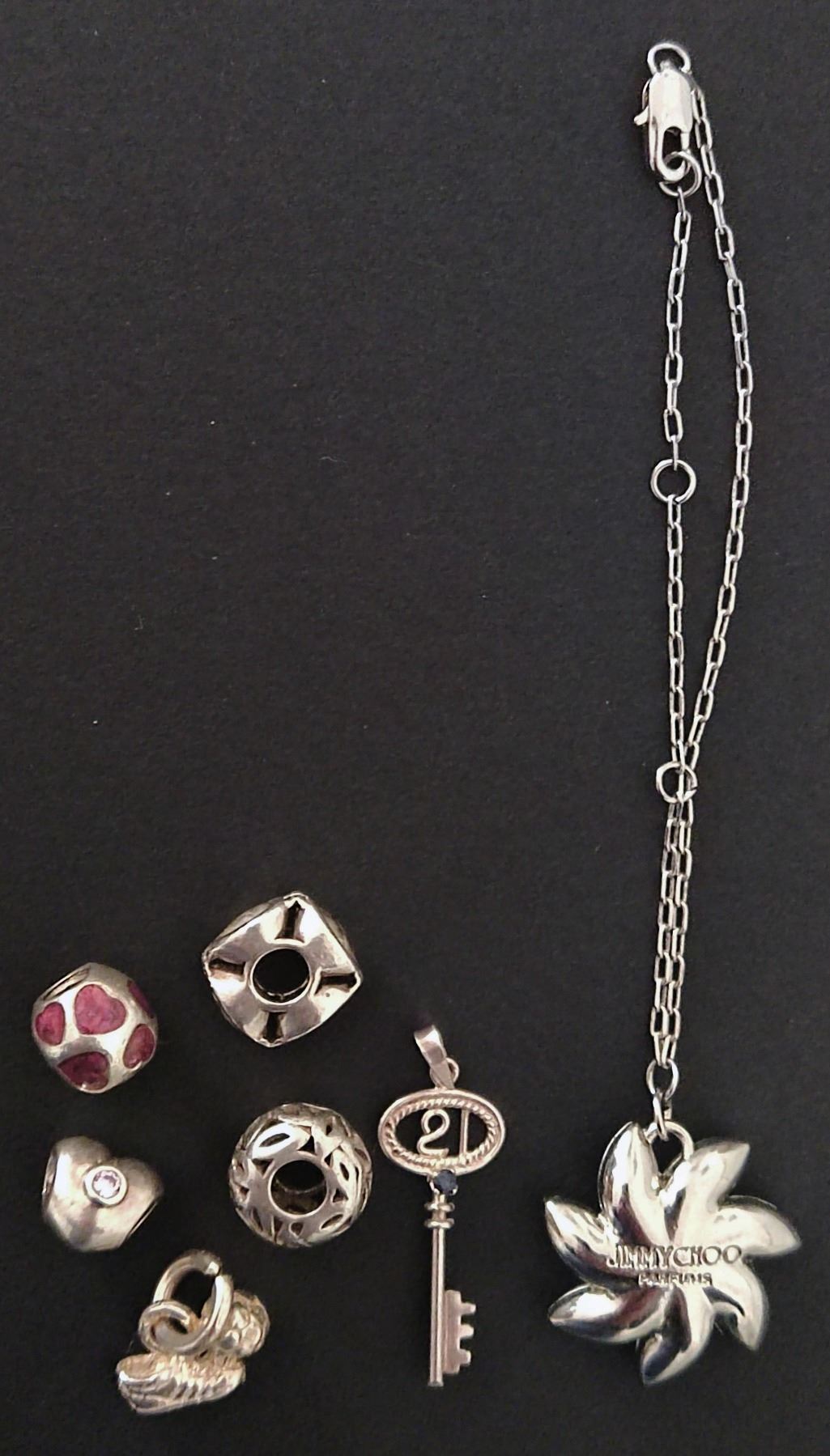Jimmy Choo necklace and a collection of silver charms (Silver tested, two hallmarked weighing 15. - Image 2 of 2