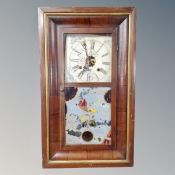 A 19th century American Waterbury Clock Company wall clock.