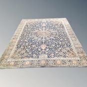 A machined carpet of Persian design 275 cm x 360 cm