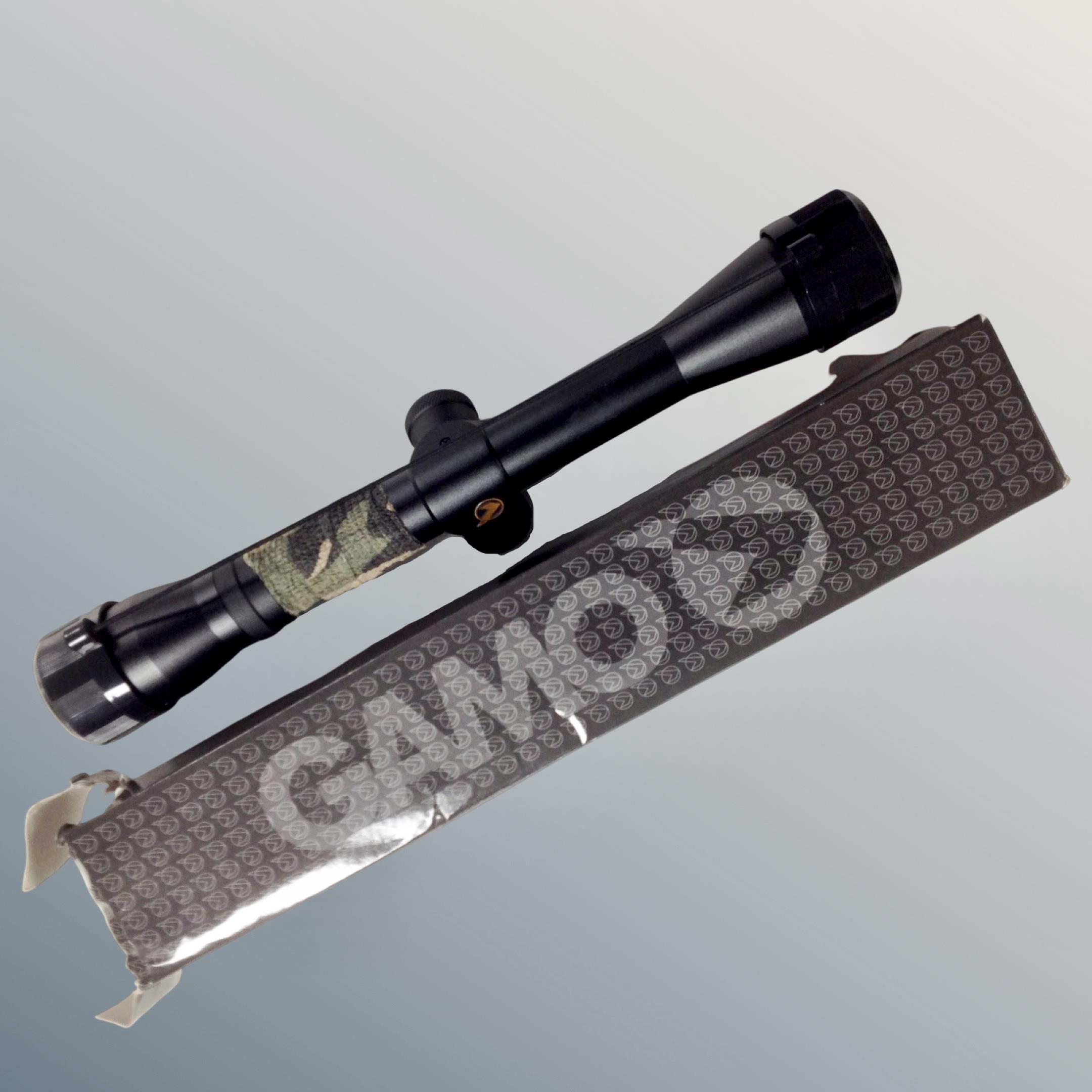 A Gamo 4x32 WR rifle scope in original box.