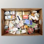 A quantity of smoking ephemera to include cigarette boxes, advertising packs, tins, tobacco tins,