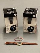 Two Vido Lifestyle Smart watches in boxes together with a Sekonda gold plated wristwatch and white