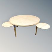 A light beech occasional table with fold out table top