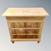 A Continental walnut four drawer chest