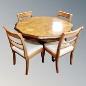 A Willis and Gambier circular pedestal table in walnut finish together with four chairs