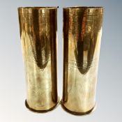 A pair of brass WWI trench art ammunition shells.