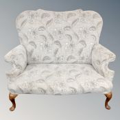An antique style two-seater settee in grey two tone fabric