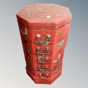 An oriental style octagonal five drawer chest