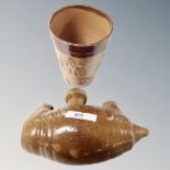 An antique glazed pottery travellers bottle,