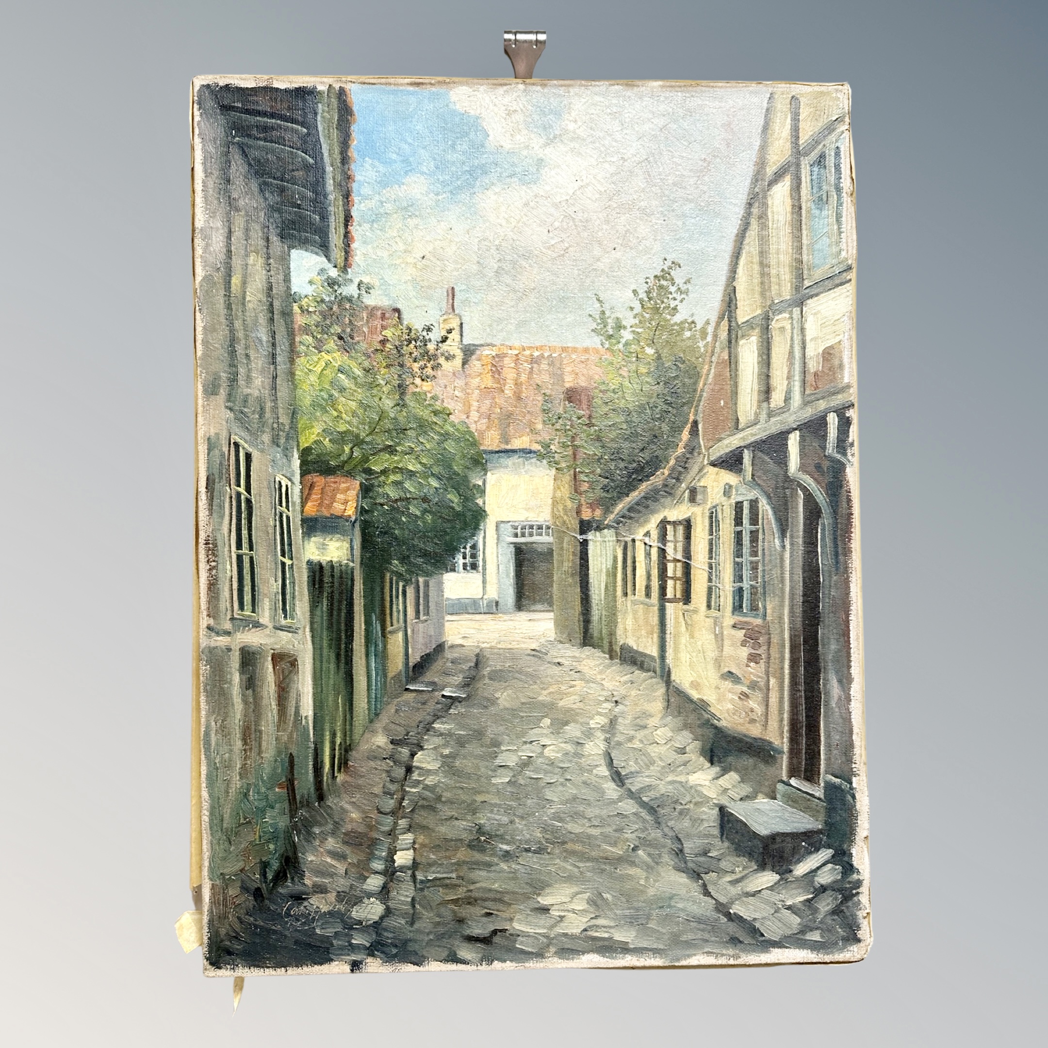 Continental School : A cobbled street, oil on canvas, 59 cm x 44 cm unframed.