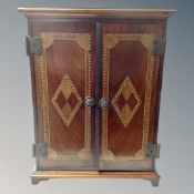 An Edwardian inlaid mahogany double door table cabinet.