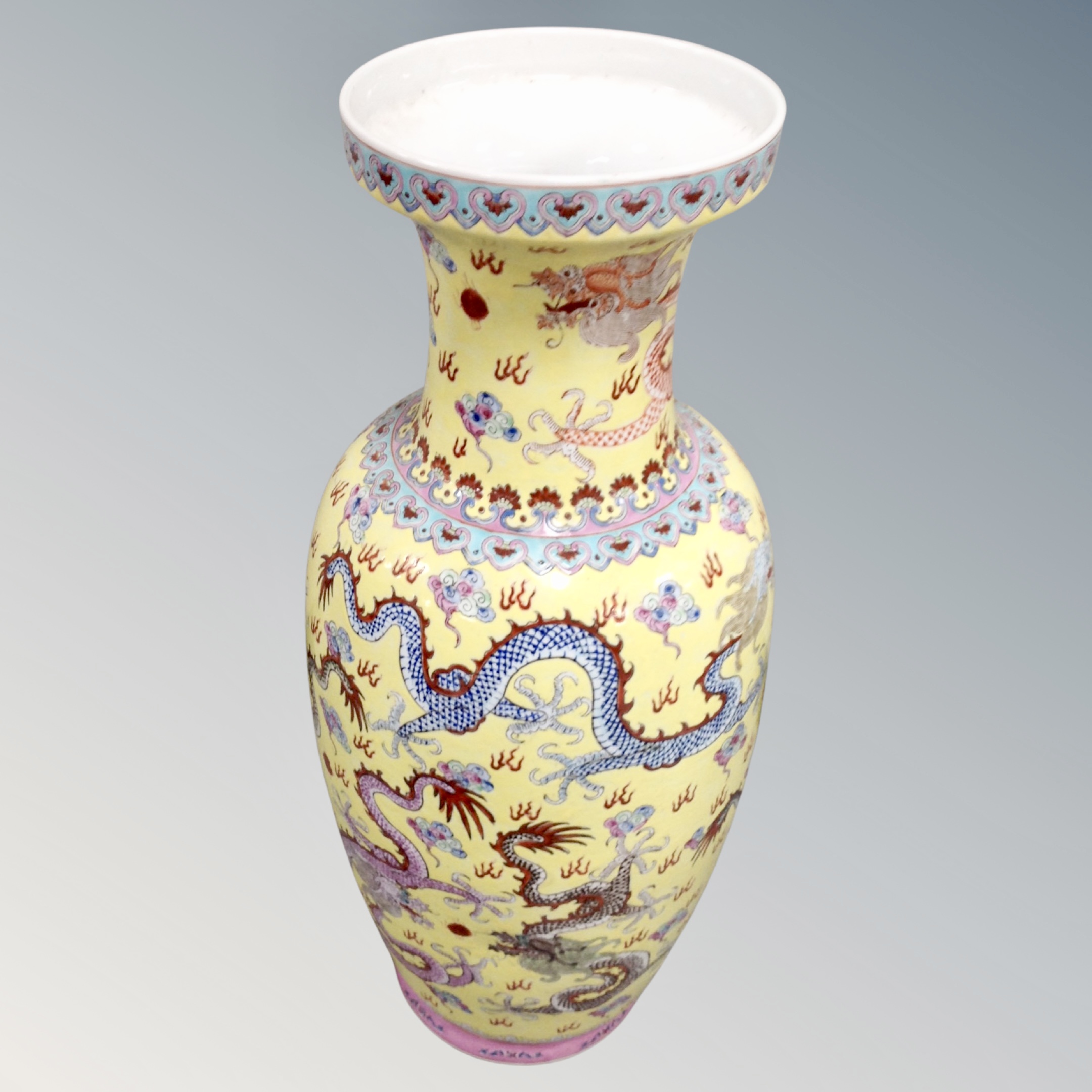 A Chinese porcelain baluster vase decorated with dragons.