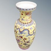 A Chinese porcelain baluster vase decorated with dragons.