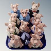 A tray containing Wade Natwest pigs together with a further plastic Natwest pig money box (11).