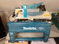 A Makita chop table saw.