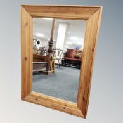 A pine framed wall mirror,