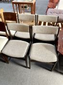Four 20th century dining chairs in oatmeal fabric